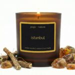 Istanbul scented candle by JoeJo + Nebria in amber glass jar with amber crystal, vetiver, and oud musk