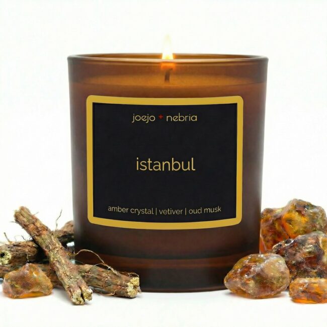 Istanbul scented candle by JoeJo + Nebria in amber glass jar with amber crystal, vetiver, and oud musk