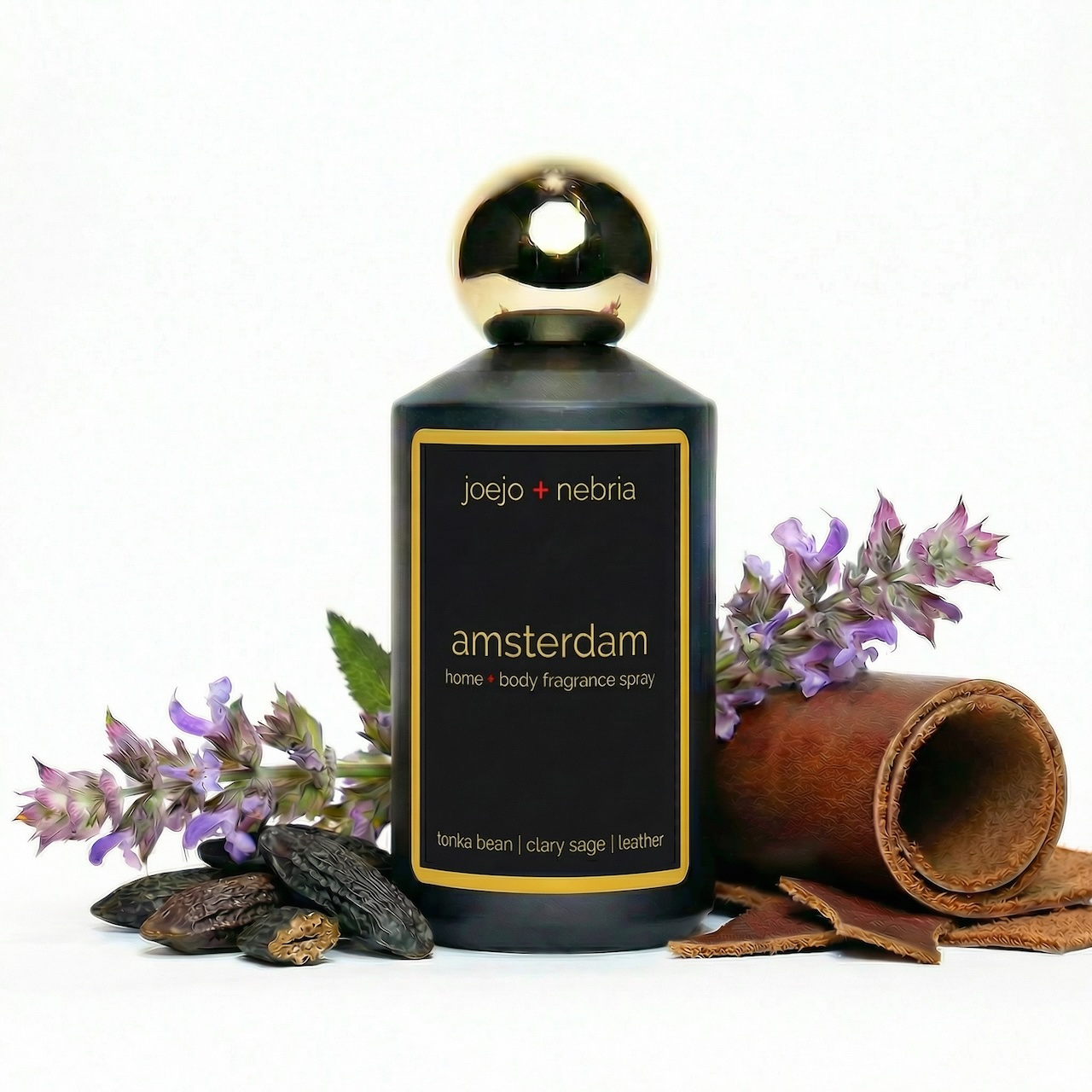 Amsterdam Home + Body Fragrance Spray by JoeJo + Nebria with tonka bean, clary sage, and leather notes