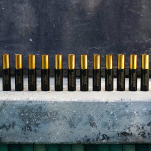 JoeJo+Nebria 12 mini luxury fragrance spray collection featuring Tokyo, Paris, Sydney, Naples, Vienna, Marrakech, Dubai, Mykonos, Milan, Copenhagen, Barcelona, and Boracay