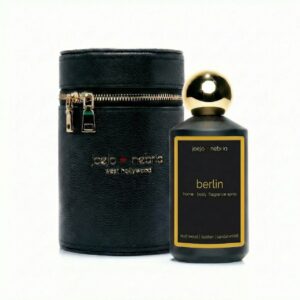 Berlin home and body fragrance spray in black bottle with black vegan leather container