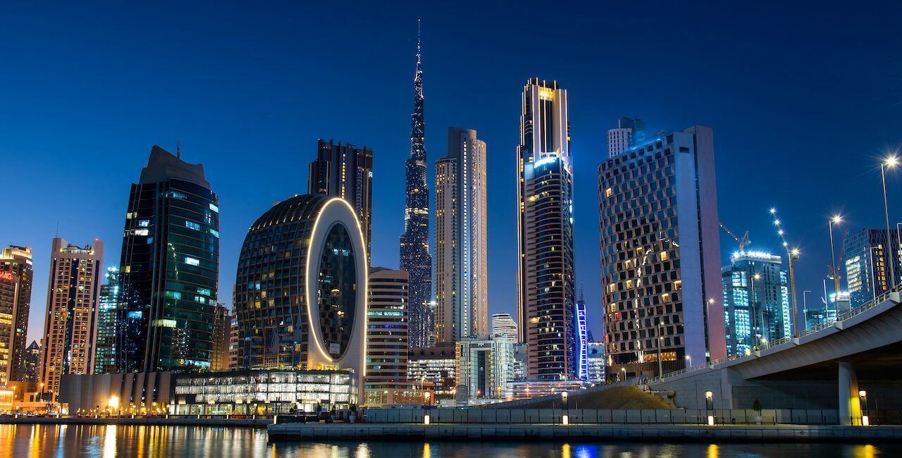 Dubai luxury fragrance – Burj Khalifa skyline at night with water reflections – JoeJo+Nebria