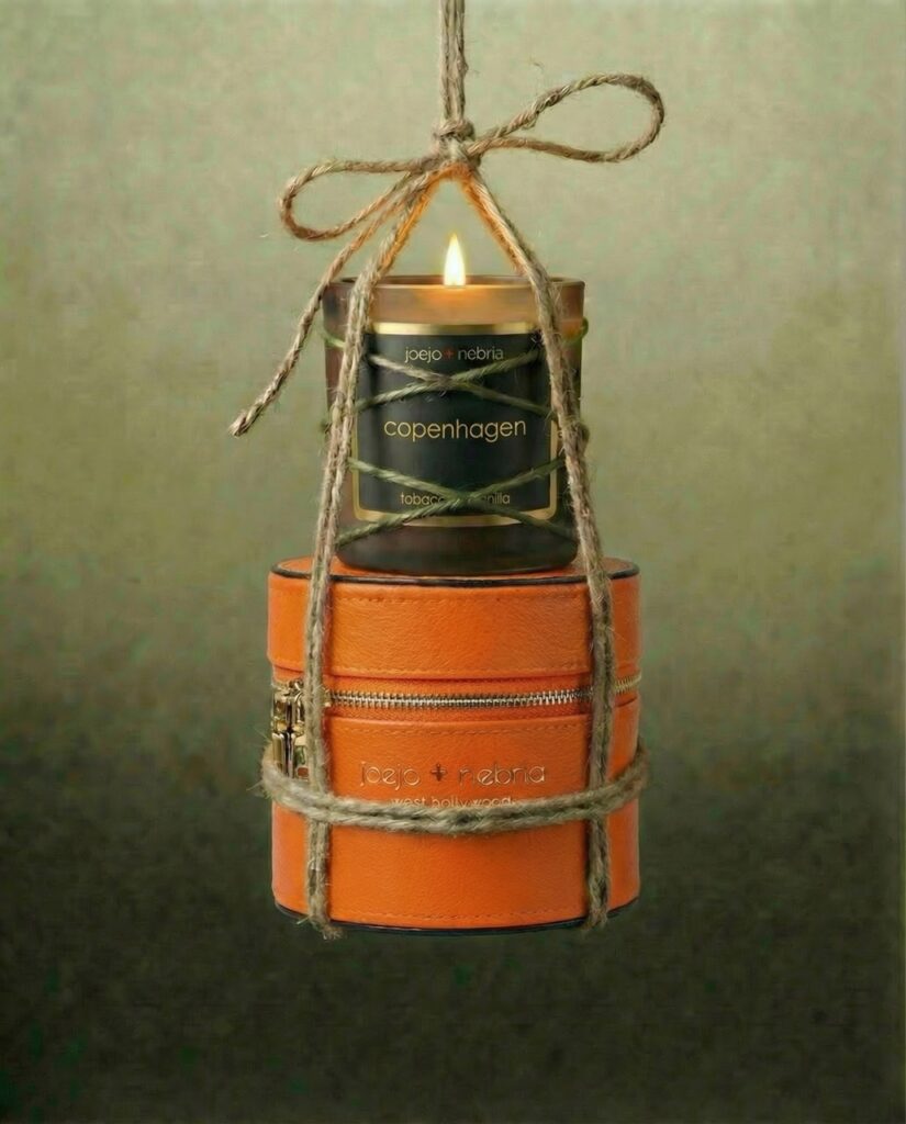Copenhagen scented candle in orange vegan leather container with twine wrap